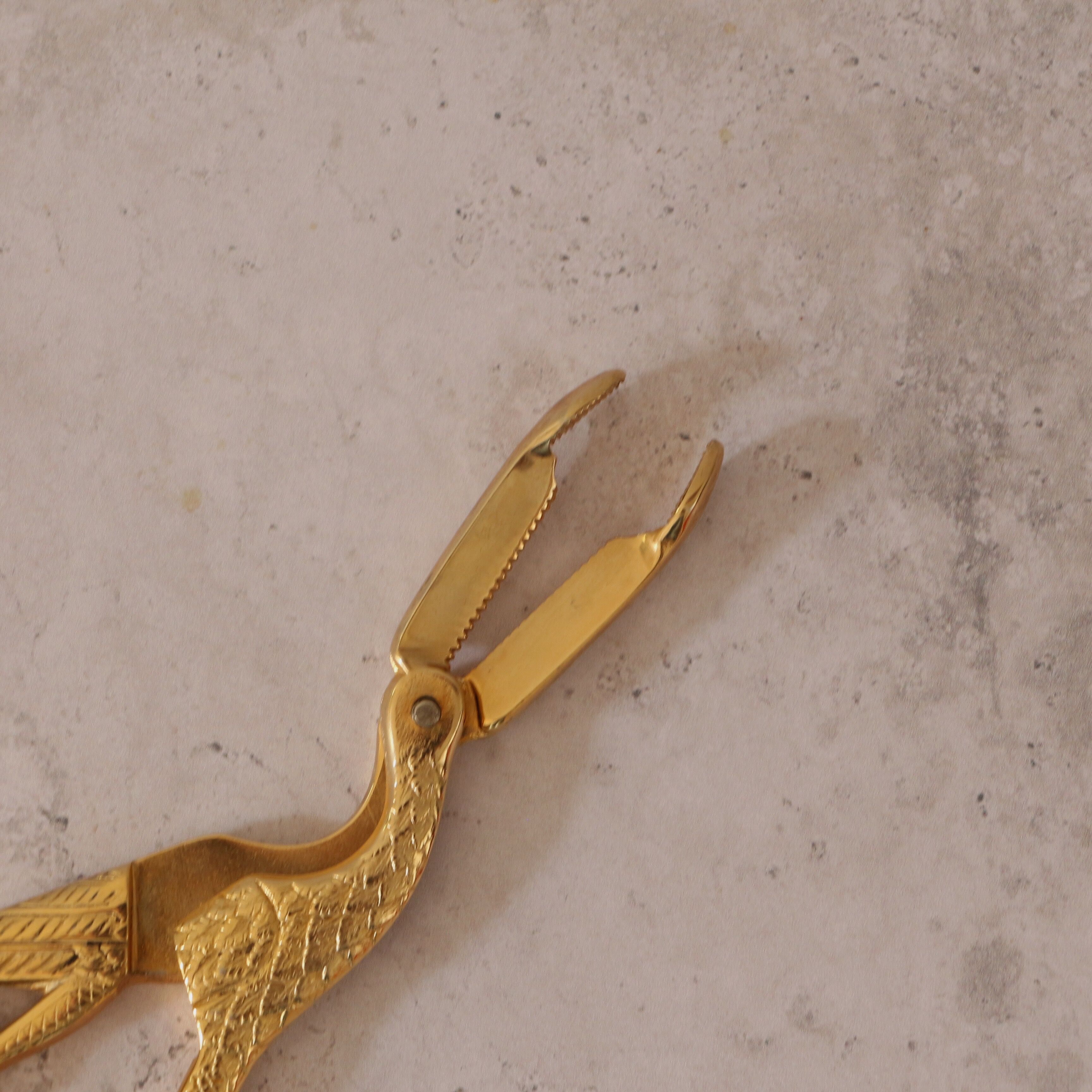 Golden bird sugar tongs