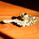 Bronze hand candle holder, cellar rat