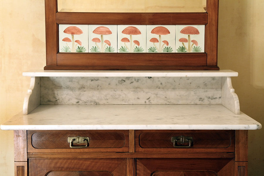 Vintage vanity toilet furniture with marble top.