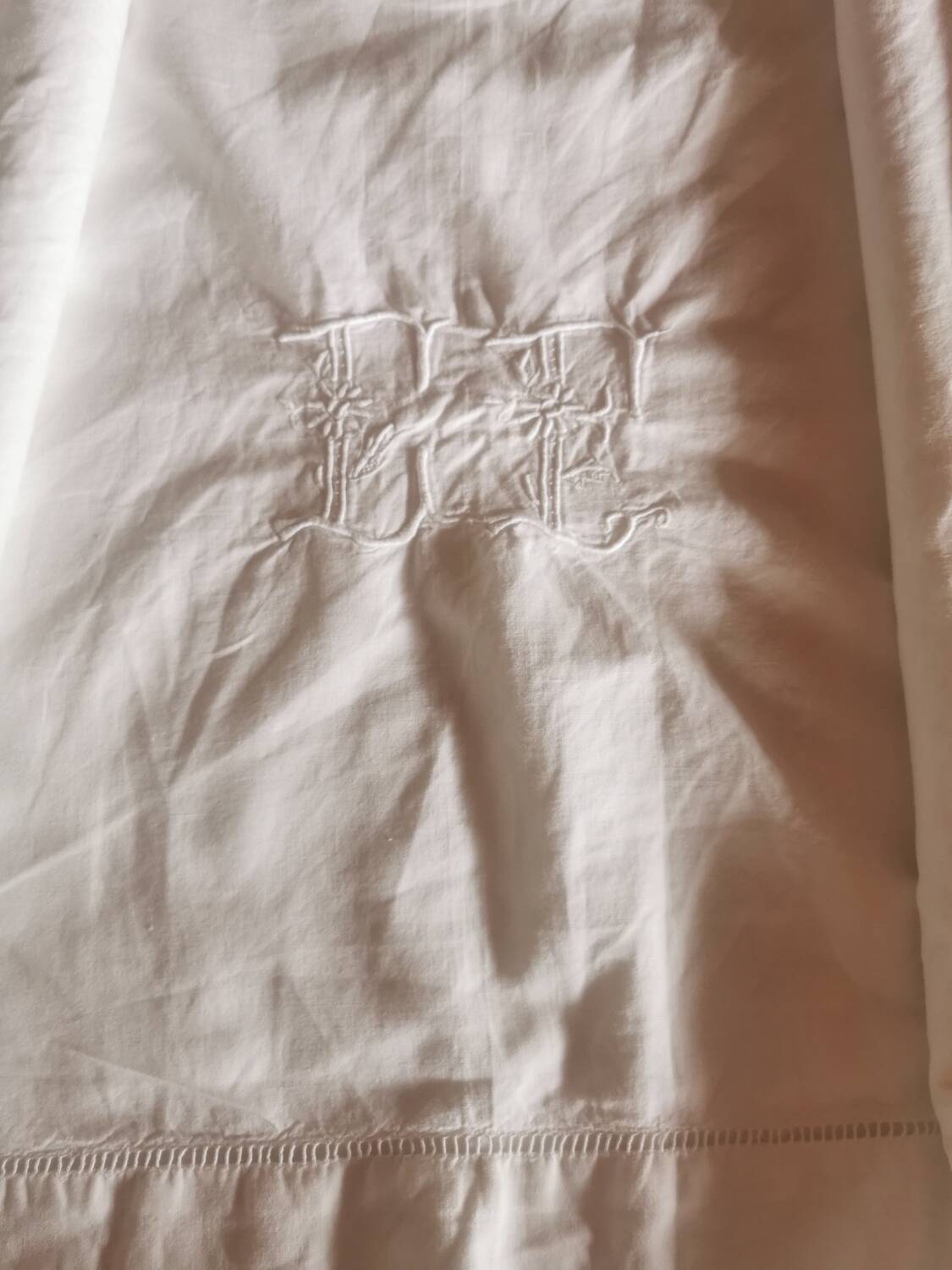 Old large monogrammed sheet hand-embroidered.