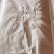 Old large monogrammed sheet hand-embroidered.