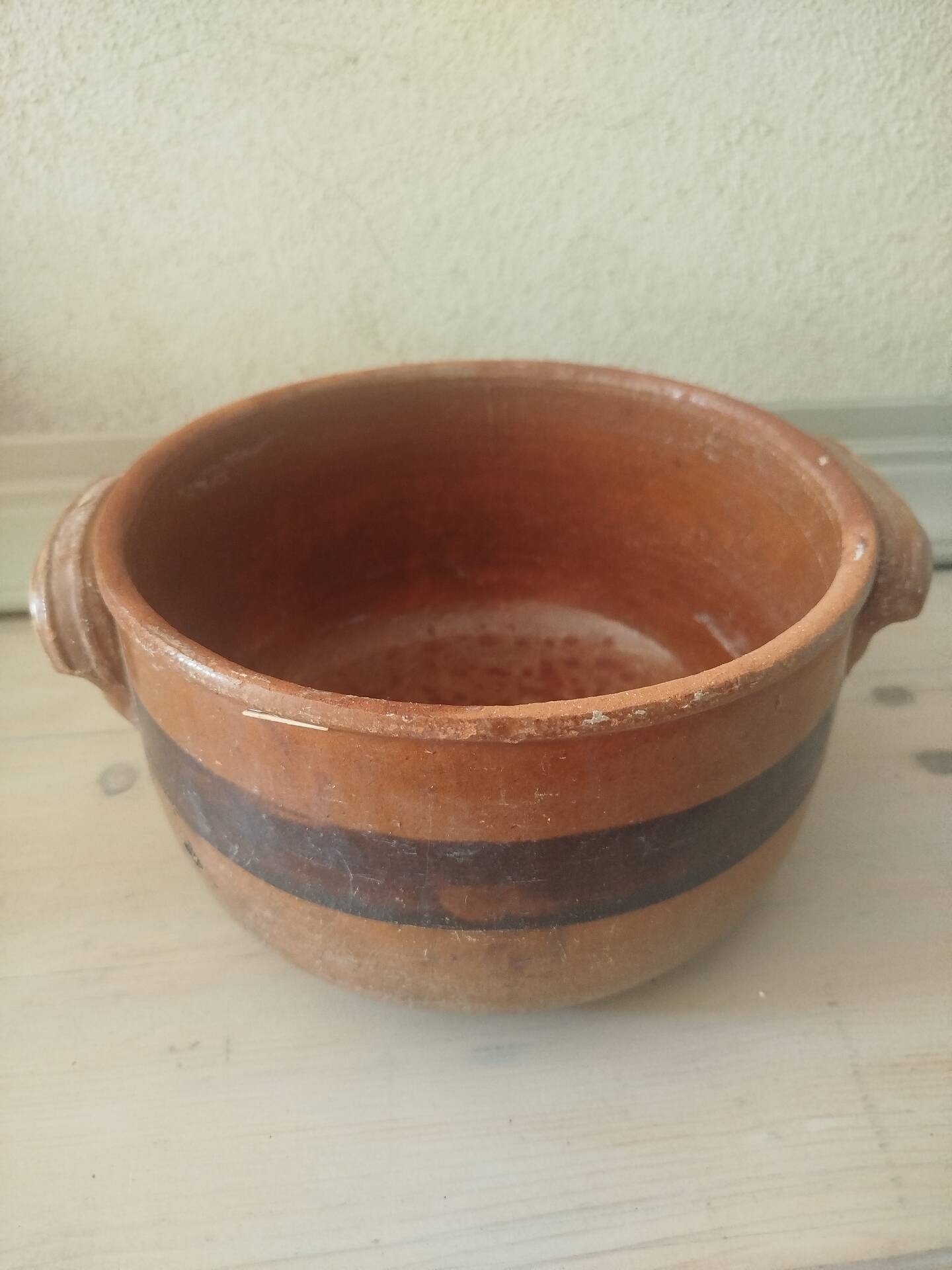 Old terracotta casserole