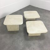 Three travertine trundle coffee tables
