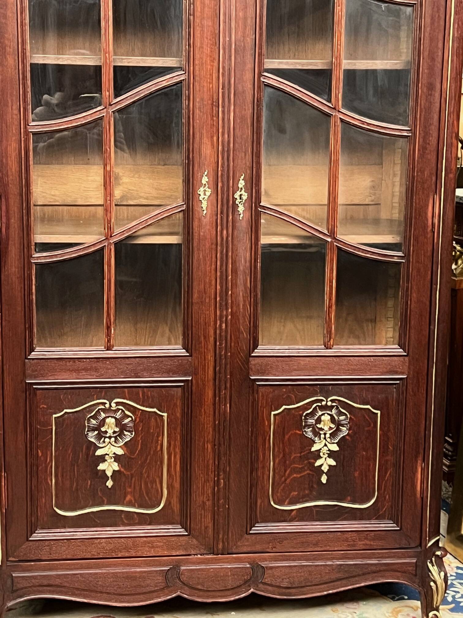 Pair of Louis XV style display cabinets. Hand-painted in gold, carved from solid oak.