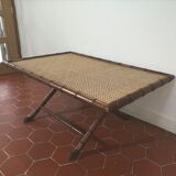 Table basse en teck sculpté et cannage 1970