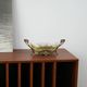 Art Nouveau ceramic platter with glazed golden finish in decorative metal frame, European