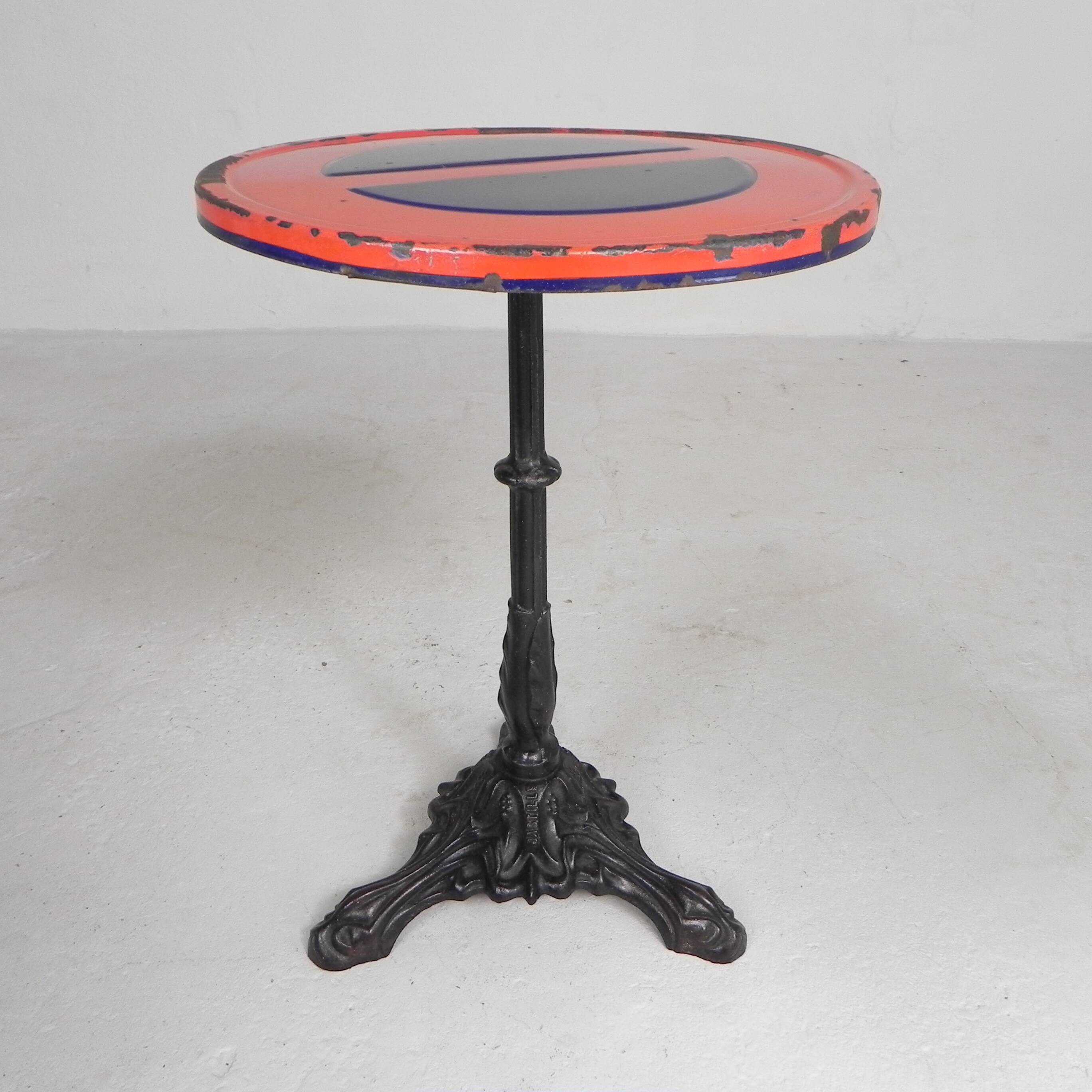 Bistro table with a cast iron base and a traffic sign as a tabletop, Paris 1920s.