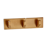 Vintage wall coat rack in pine with 3 hooks.