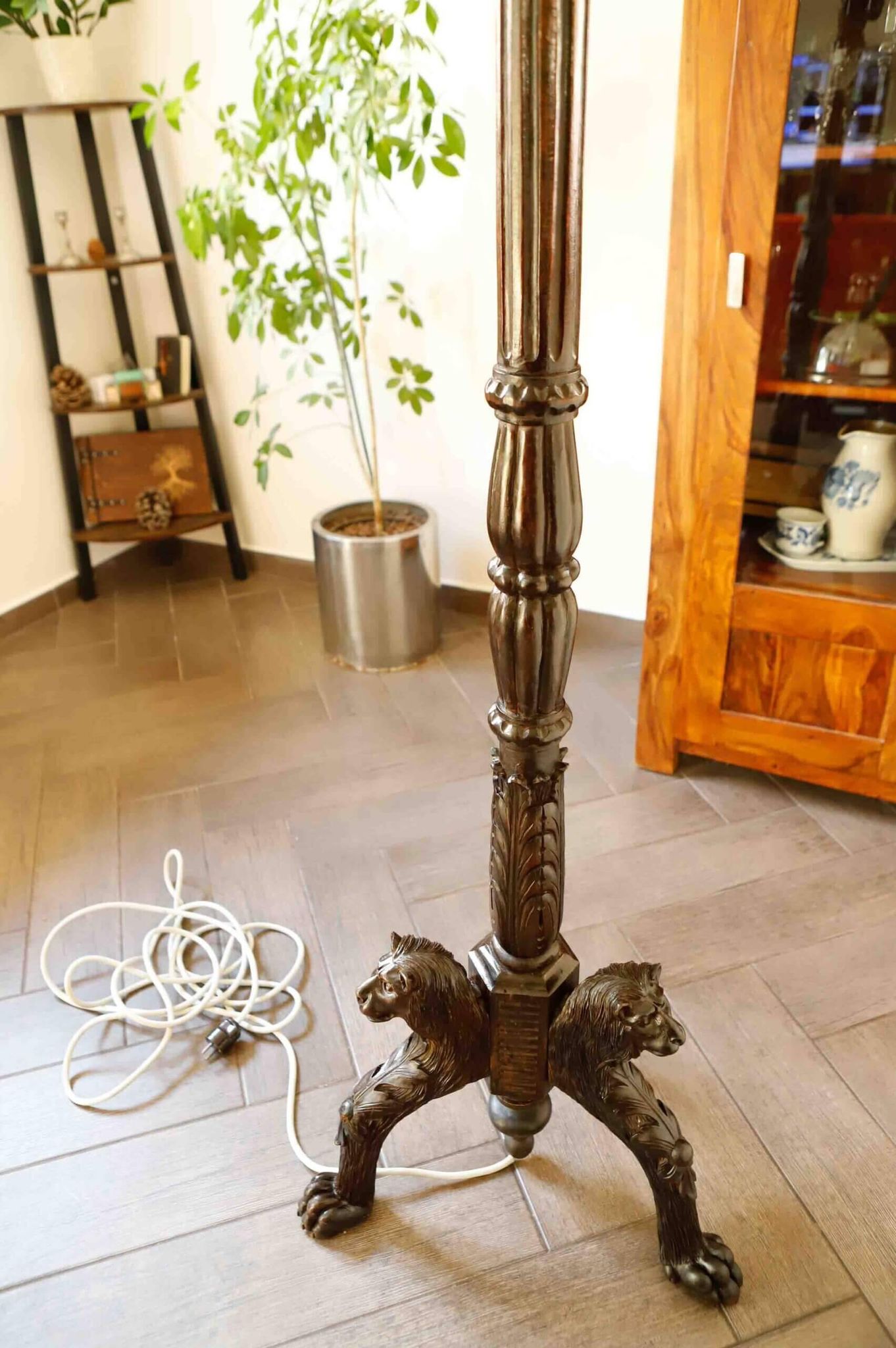 Antique floor lamp with lion motif