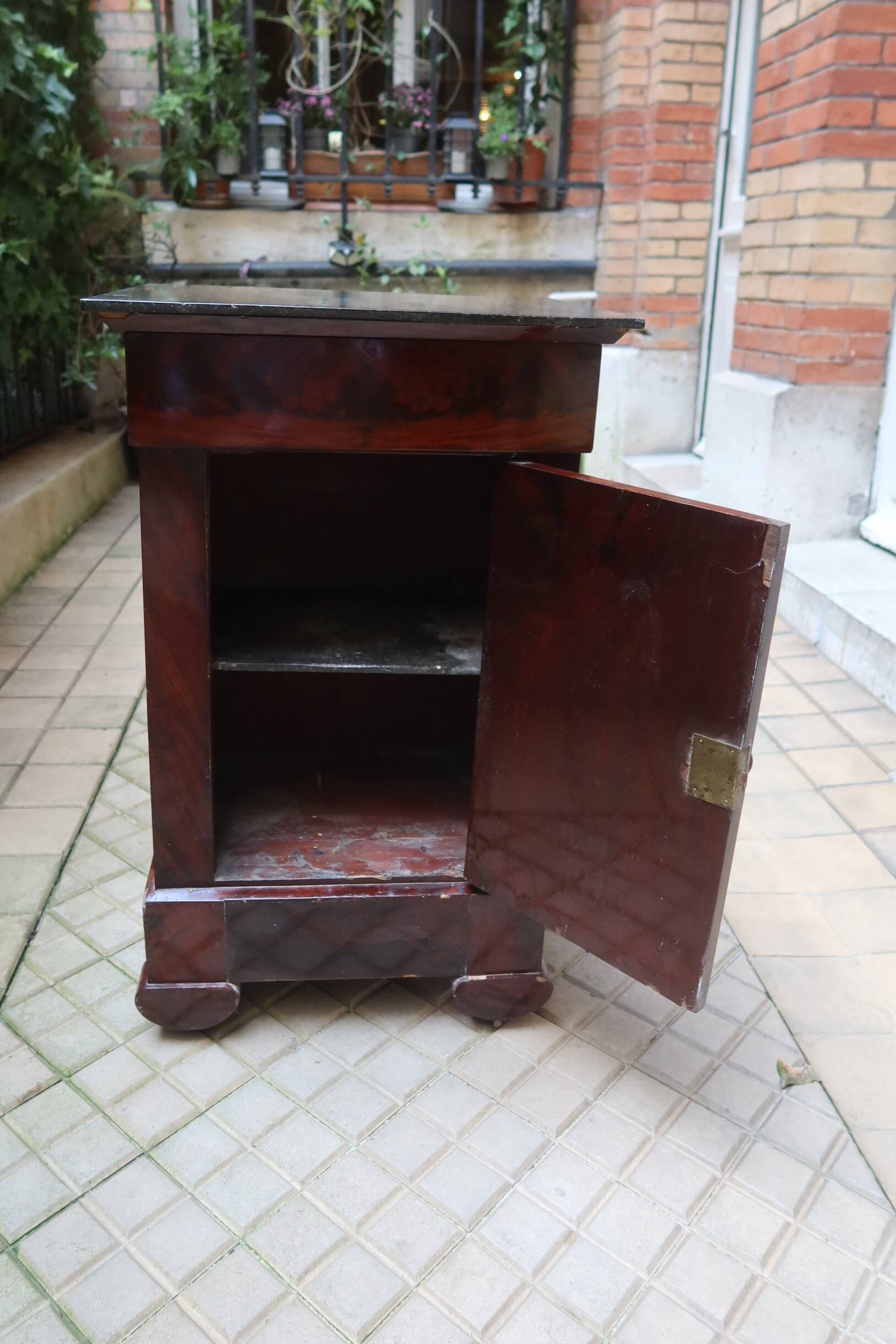 Mahogany bedside table with marble top