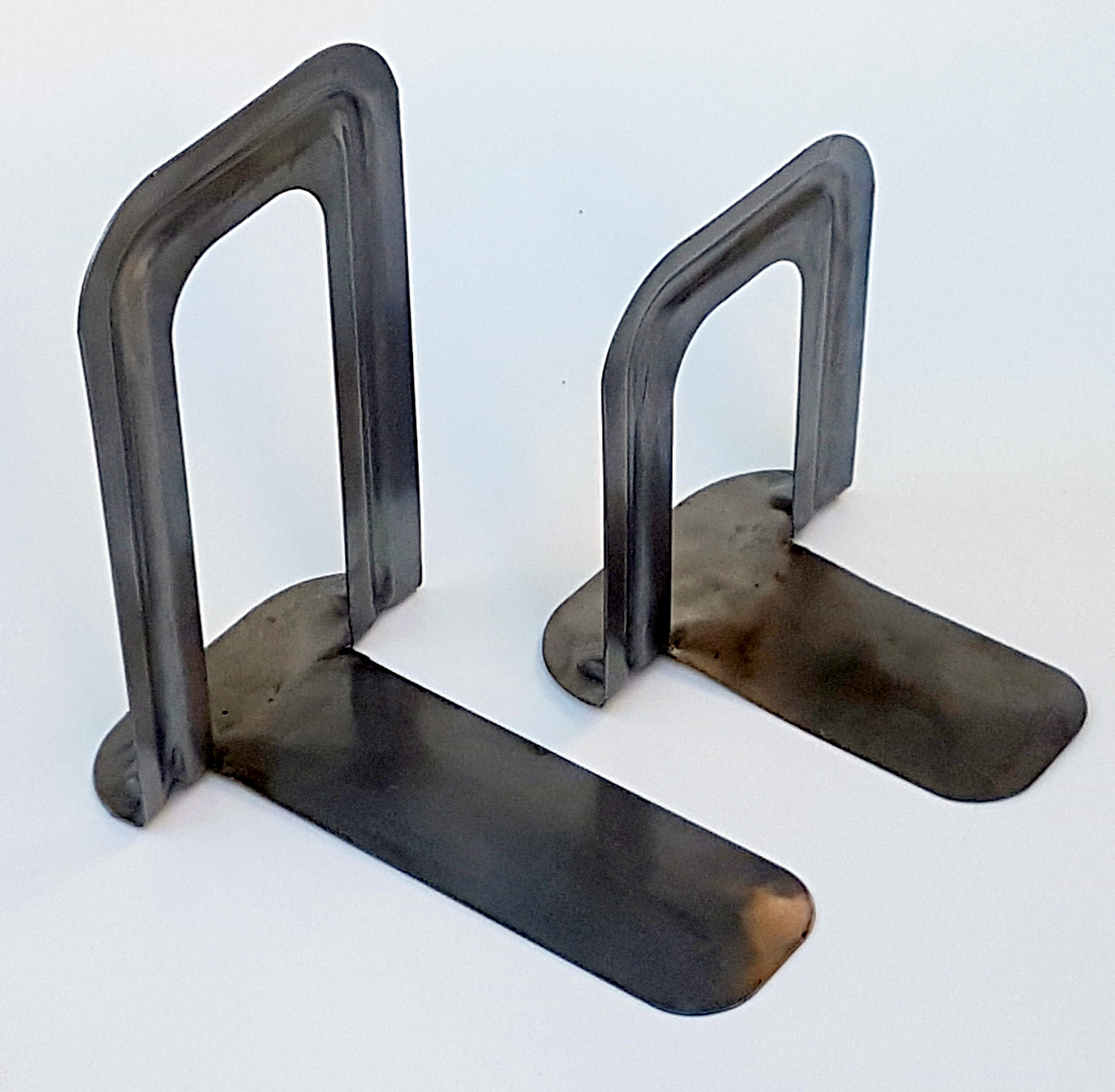 Metal book clamsended by Bernard-Albin Gras for Gras Ravel