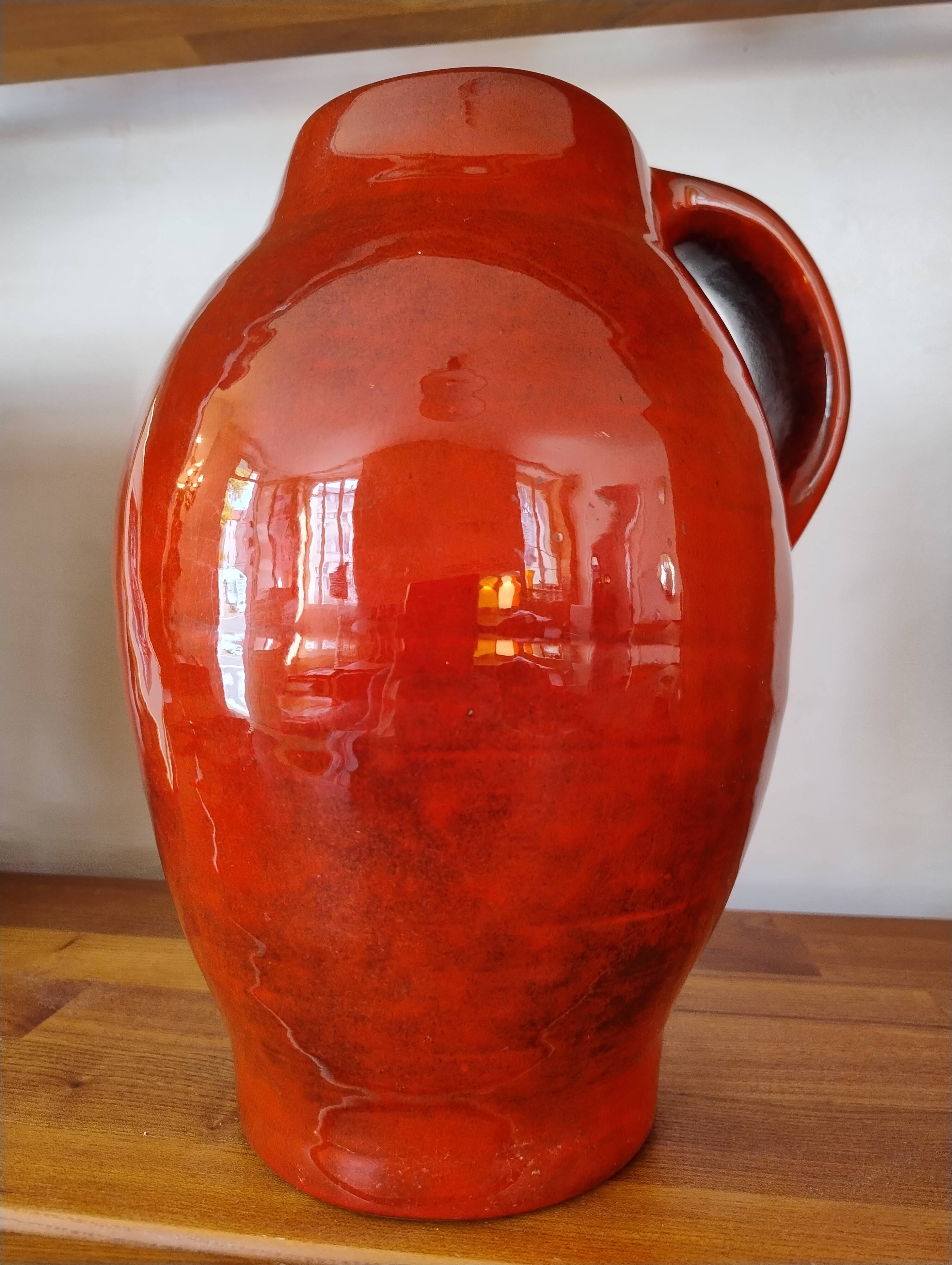 Large red jug or vase by Max Idlas