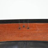 Black cowhide leather and wooden Art Deco design armchair