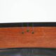 Black cowhide leather and wooden Art Deco design armchair