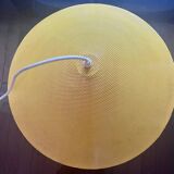 Yellow perforated sheet metal suspension
