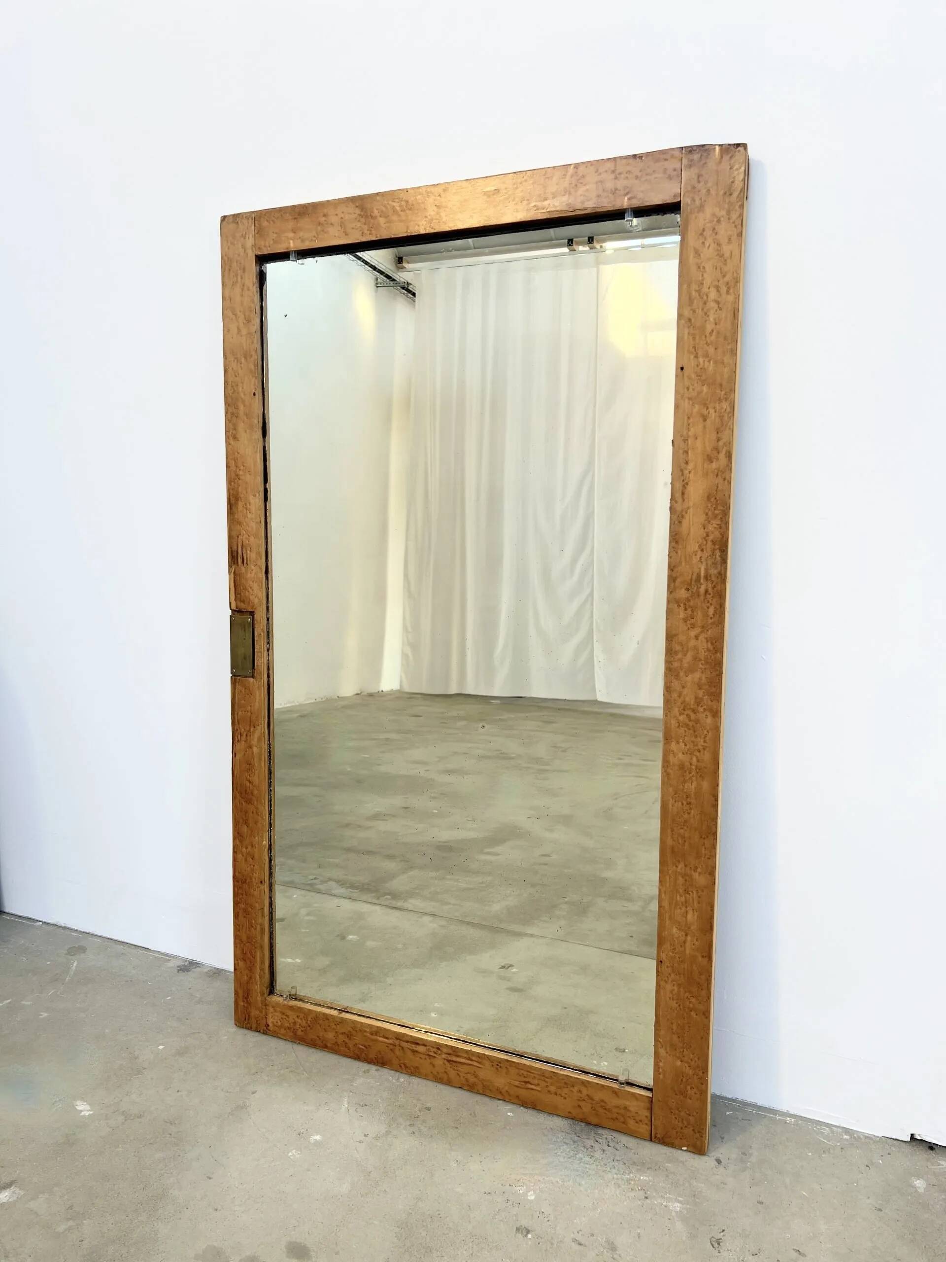 Antique mirror on an elm wardrobe door