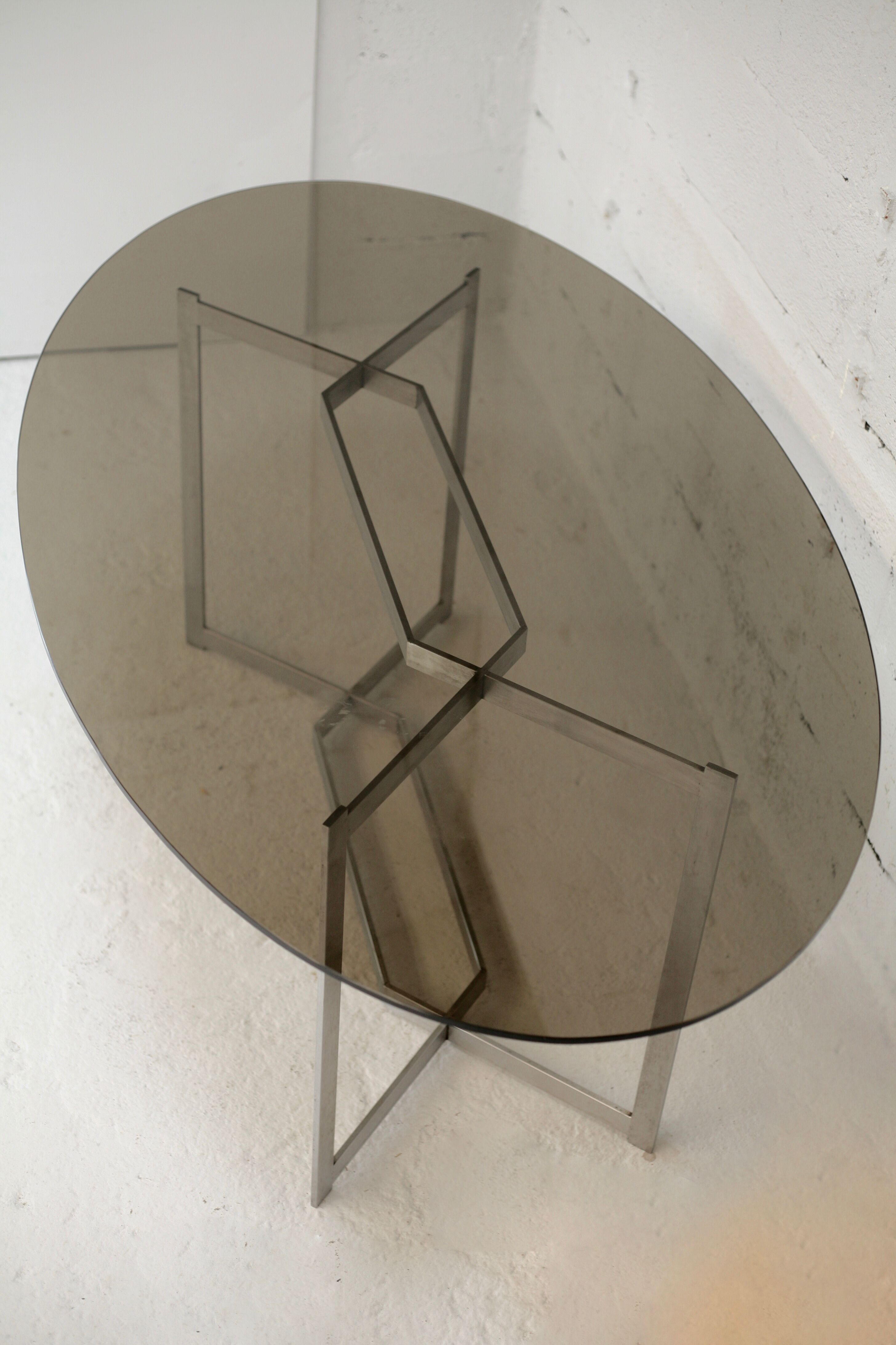 Table de Paul Legard, édition DOM, aluminium brossé et dalle elliptique de verre fumé, France, circa