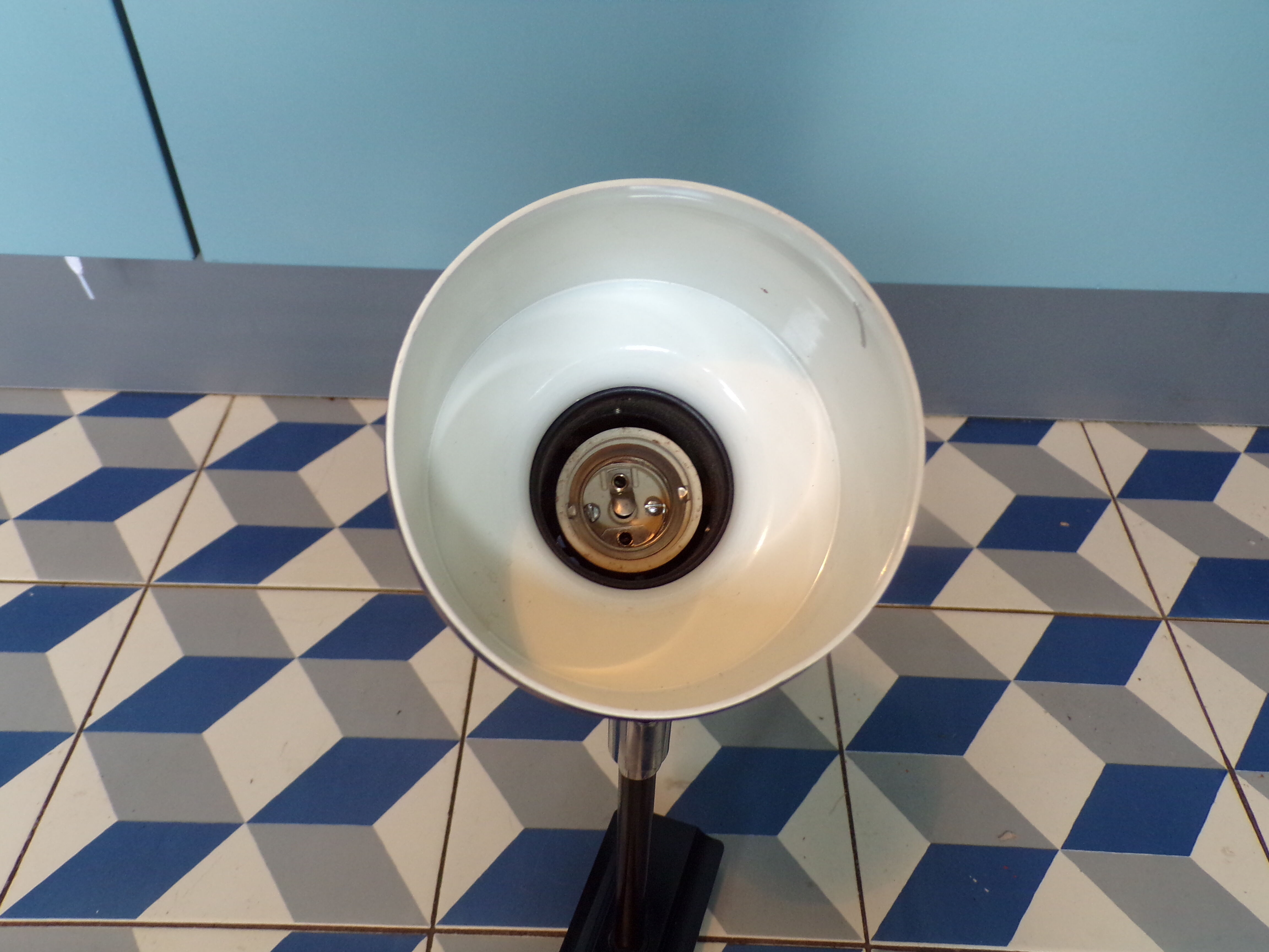 Space age articulated sconce