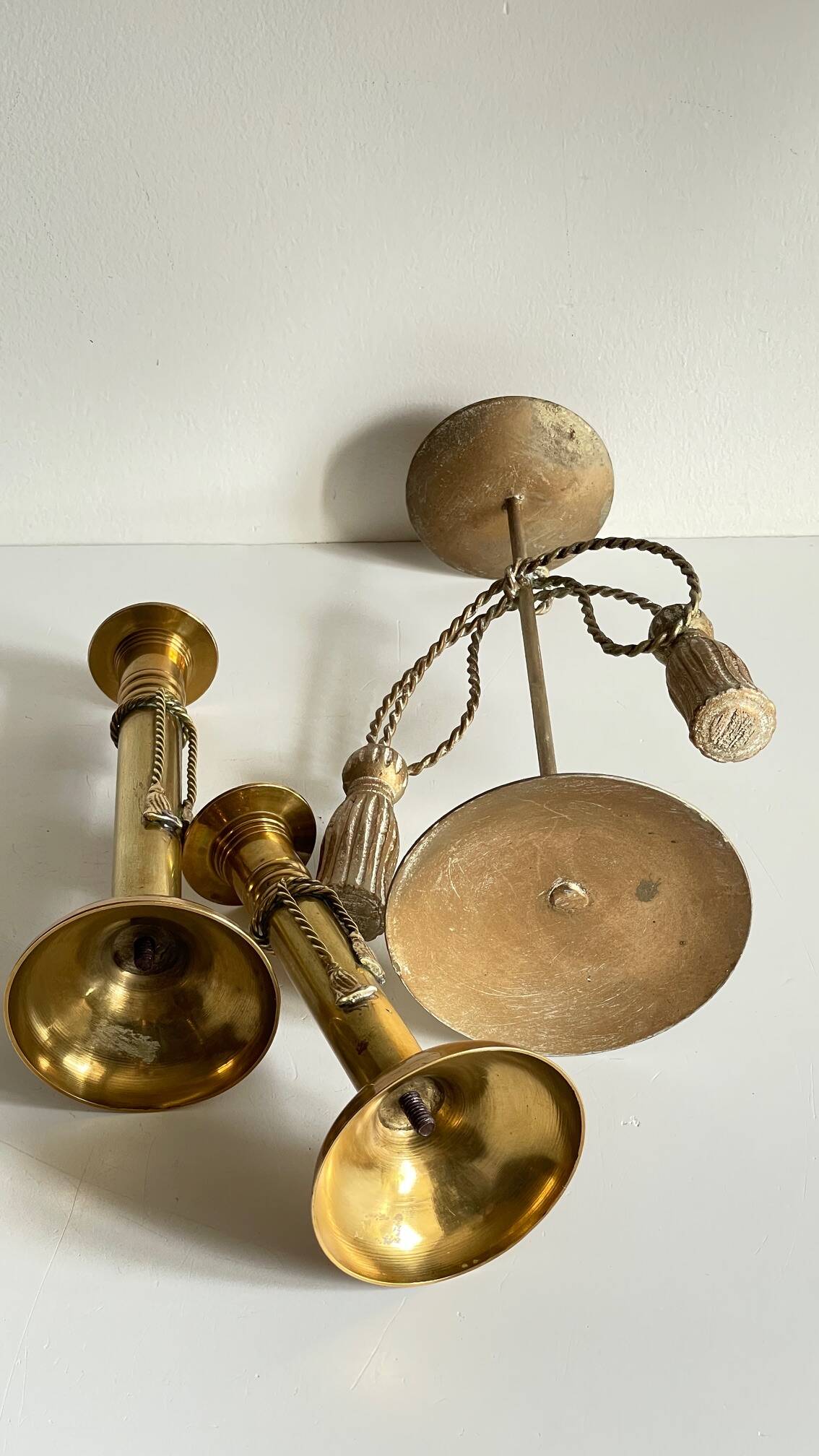 Trio of vintage knotted candlesticks brass