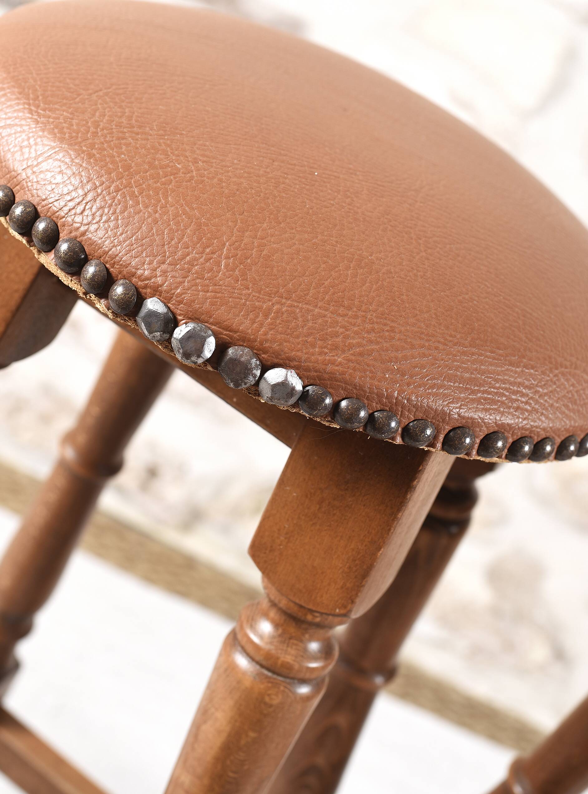 Antique bar stools, brown leather and wood