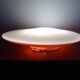 Oval wall lamp design ARTEMIDE 1980 by Patrick Jouin orange/white