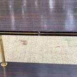 Brown rosewood rolling table with gold legs
