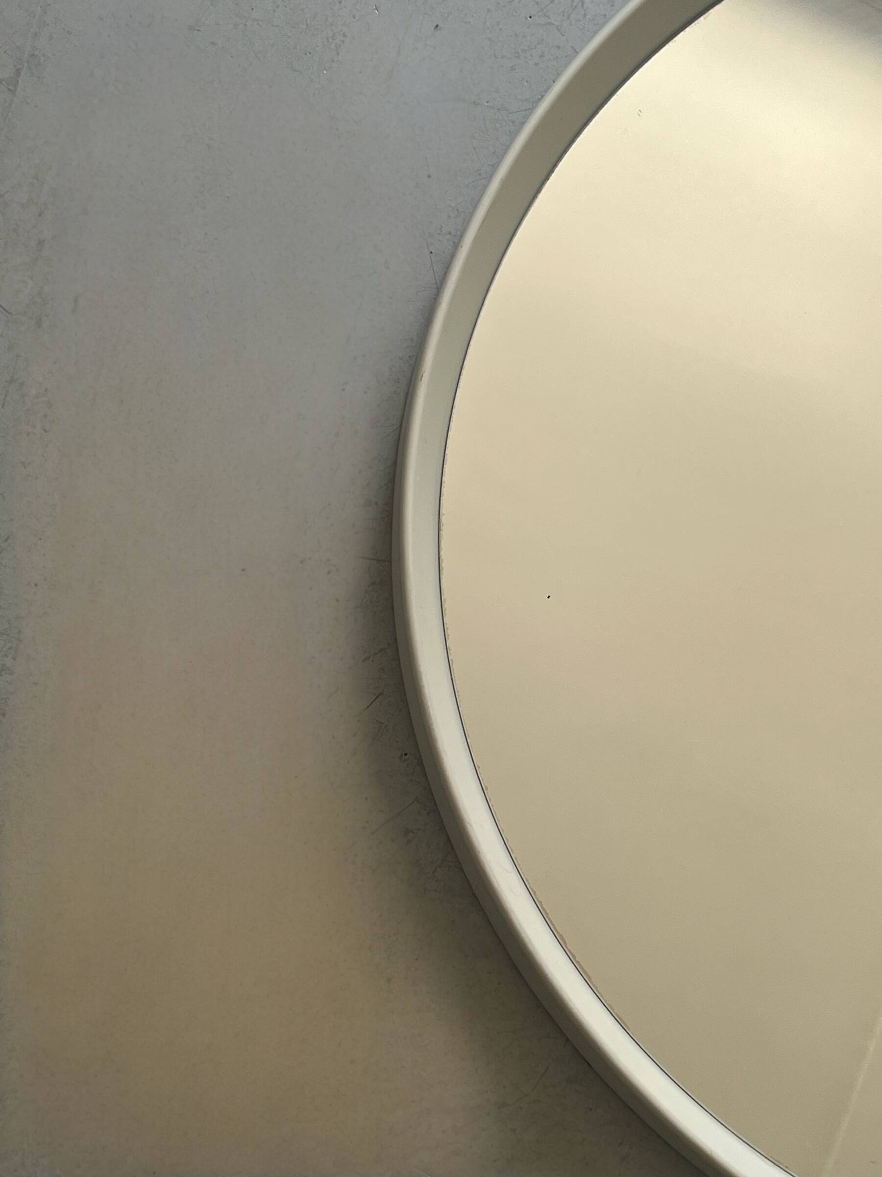 Large round white mirror space age design from around 1970.
