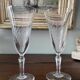 2 antique blown glass champagne flutes, tulip shape.