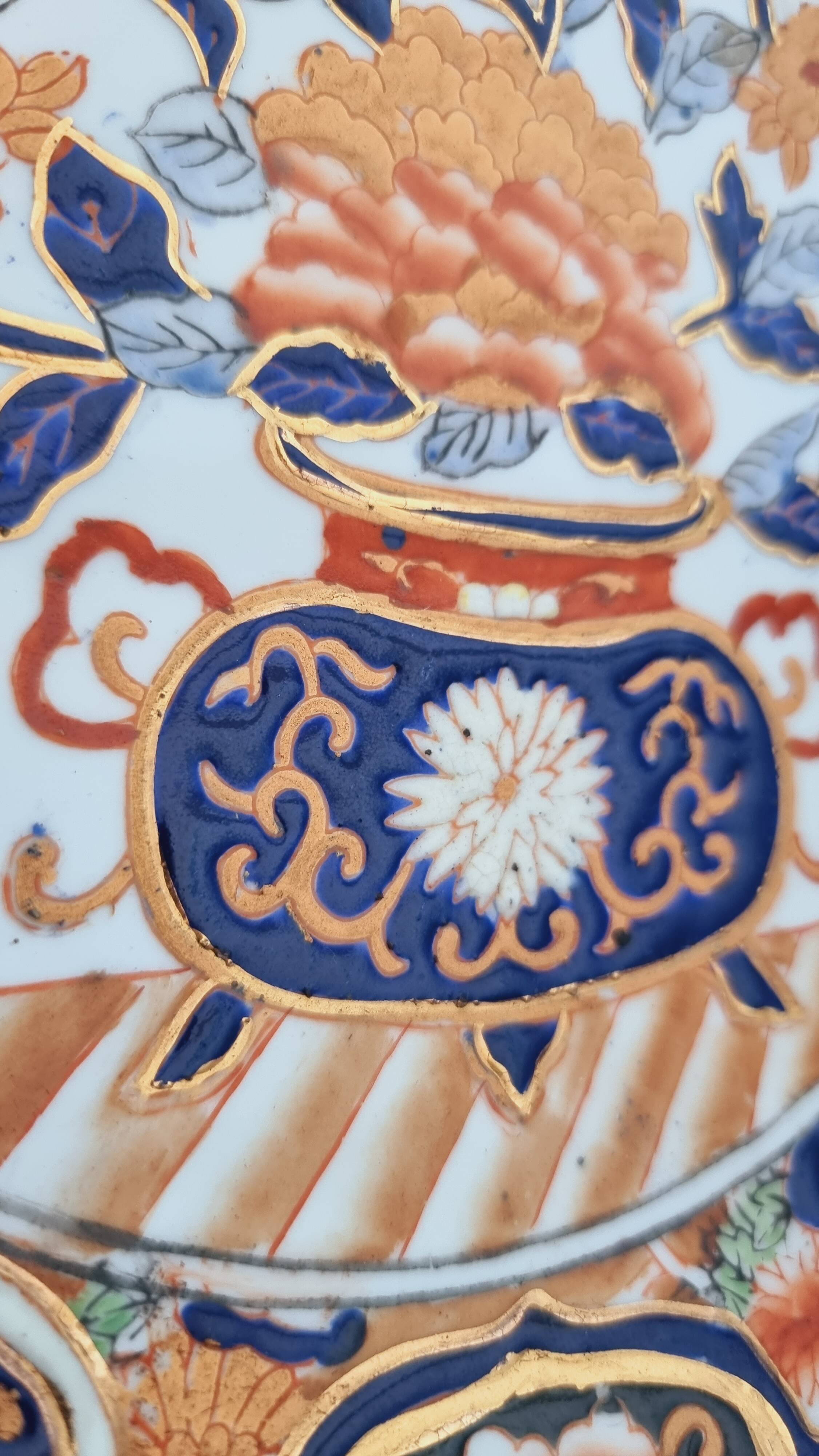 Imari-style porcelain plate, hand-painted, Japan, mid-20th century.
