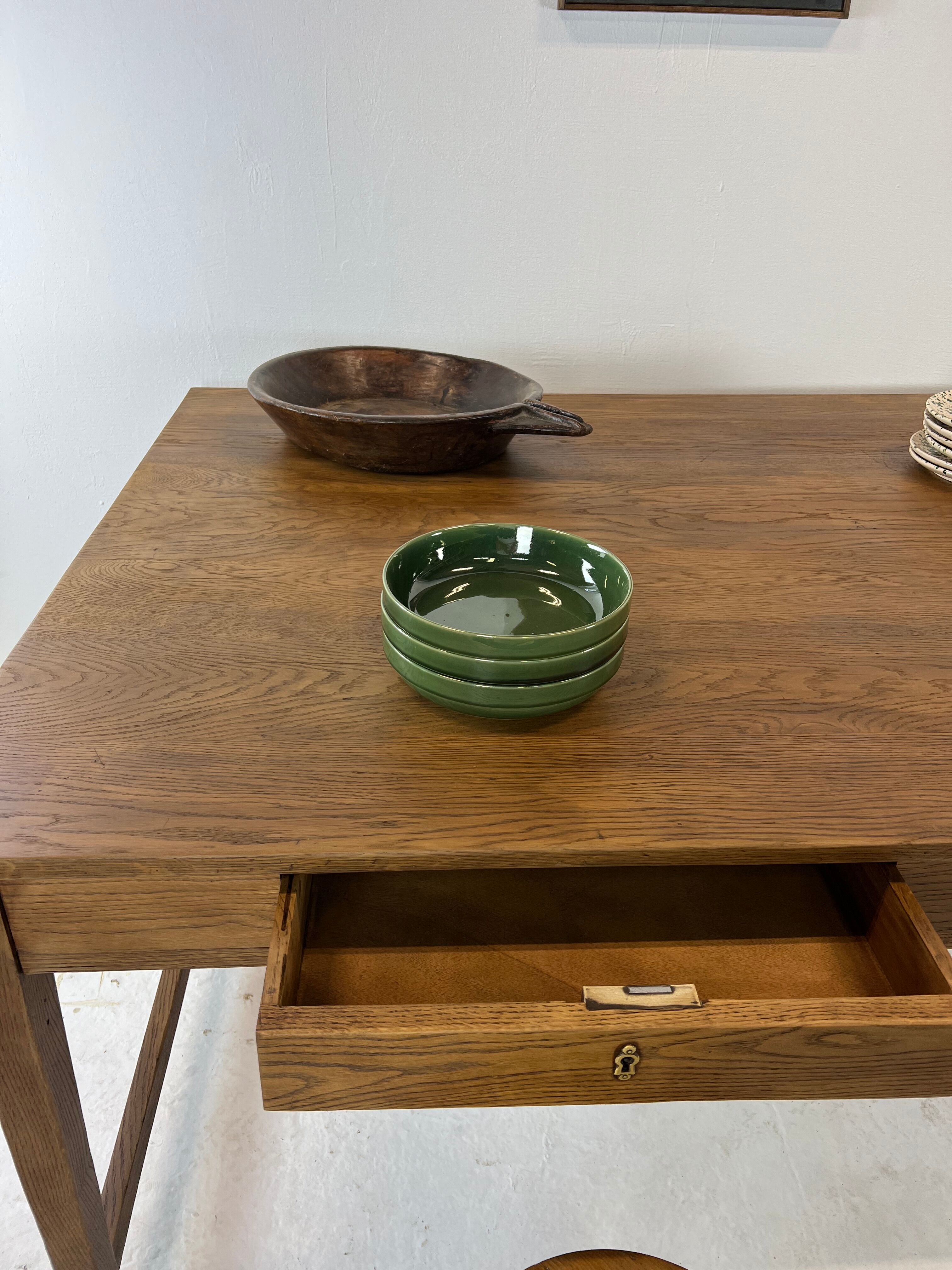 Two-sided oak work table, with 4 drawers