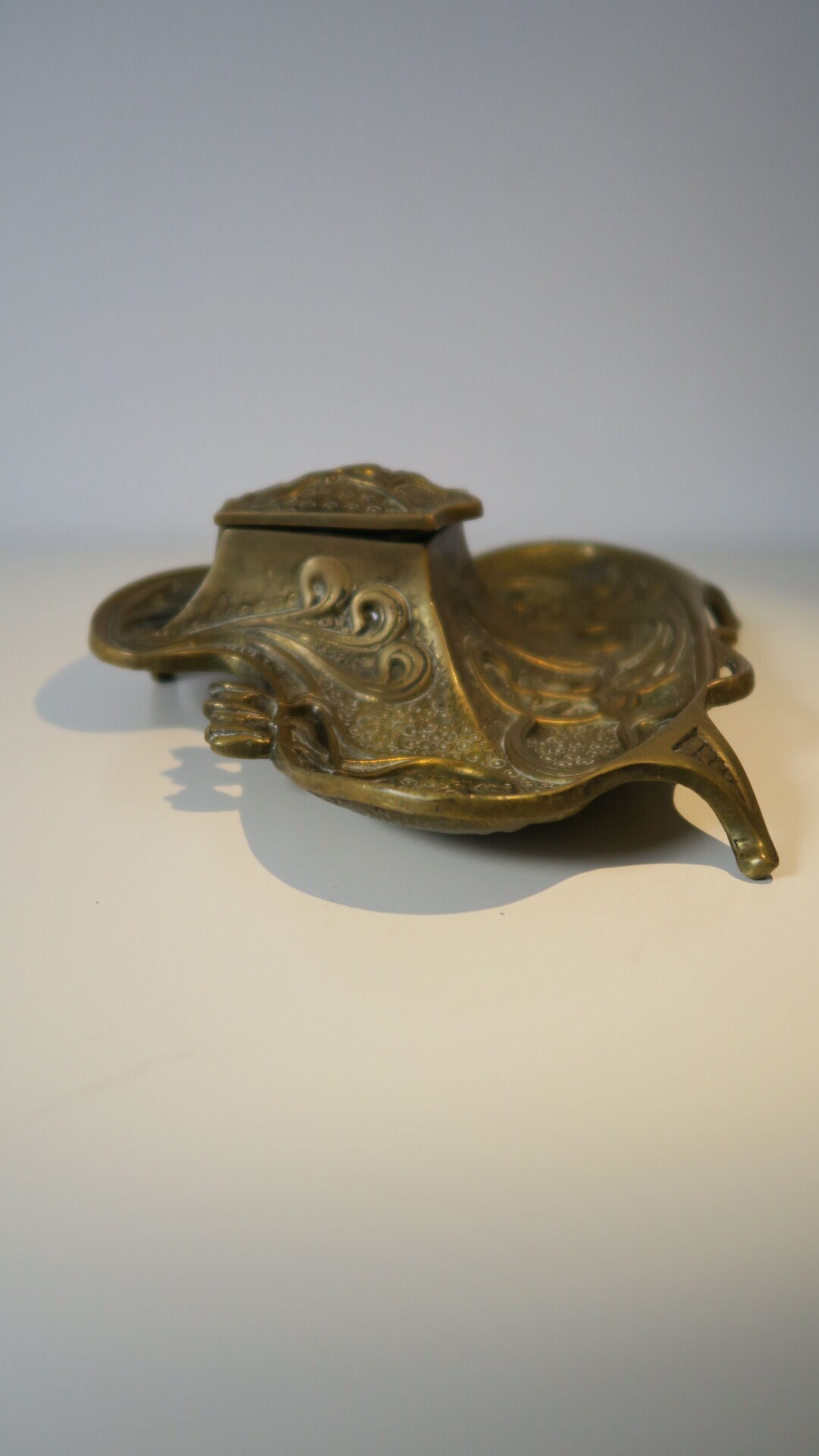 Brass inkwell