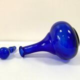 Antique decanter made of cobalt blue glass