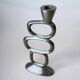 Circle candlestick by Matthew Hilton, solid aluminium, England, 1980s