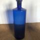Blue bottle with cork stopper