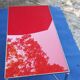 Brass coffee table with red glass top