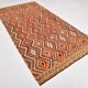 Tapis Kilim tribal rouge et orange fait main
