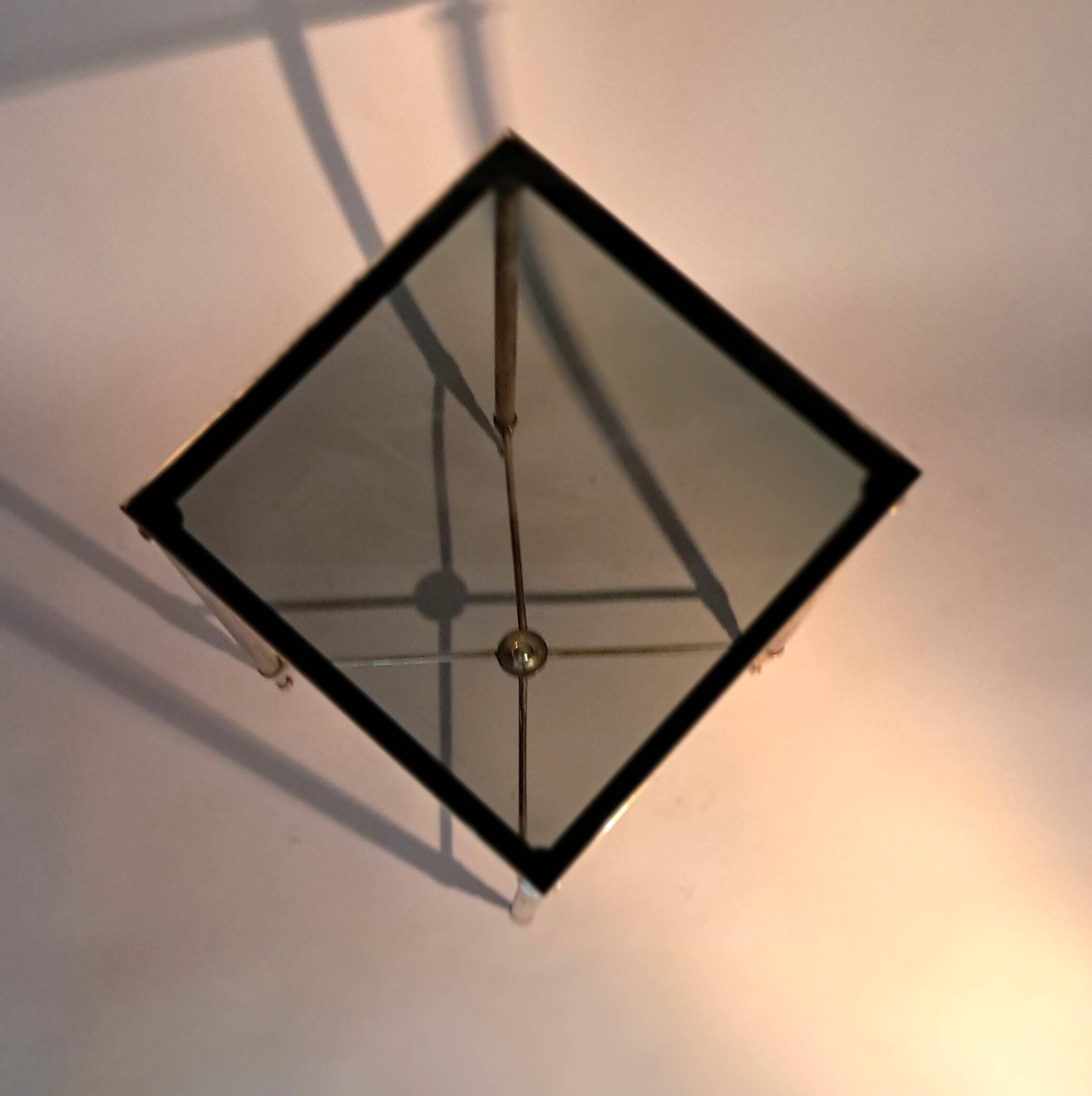 Gold brass side table in neoclassical style, circa 1960.