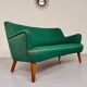 Old vintage green cocktail bean sofa from the 50s