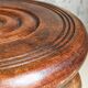 Low tripod stool in vintage turned solid wood