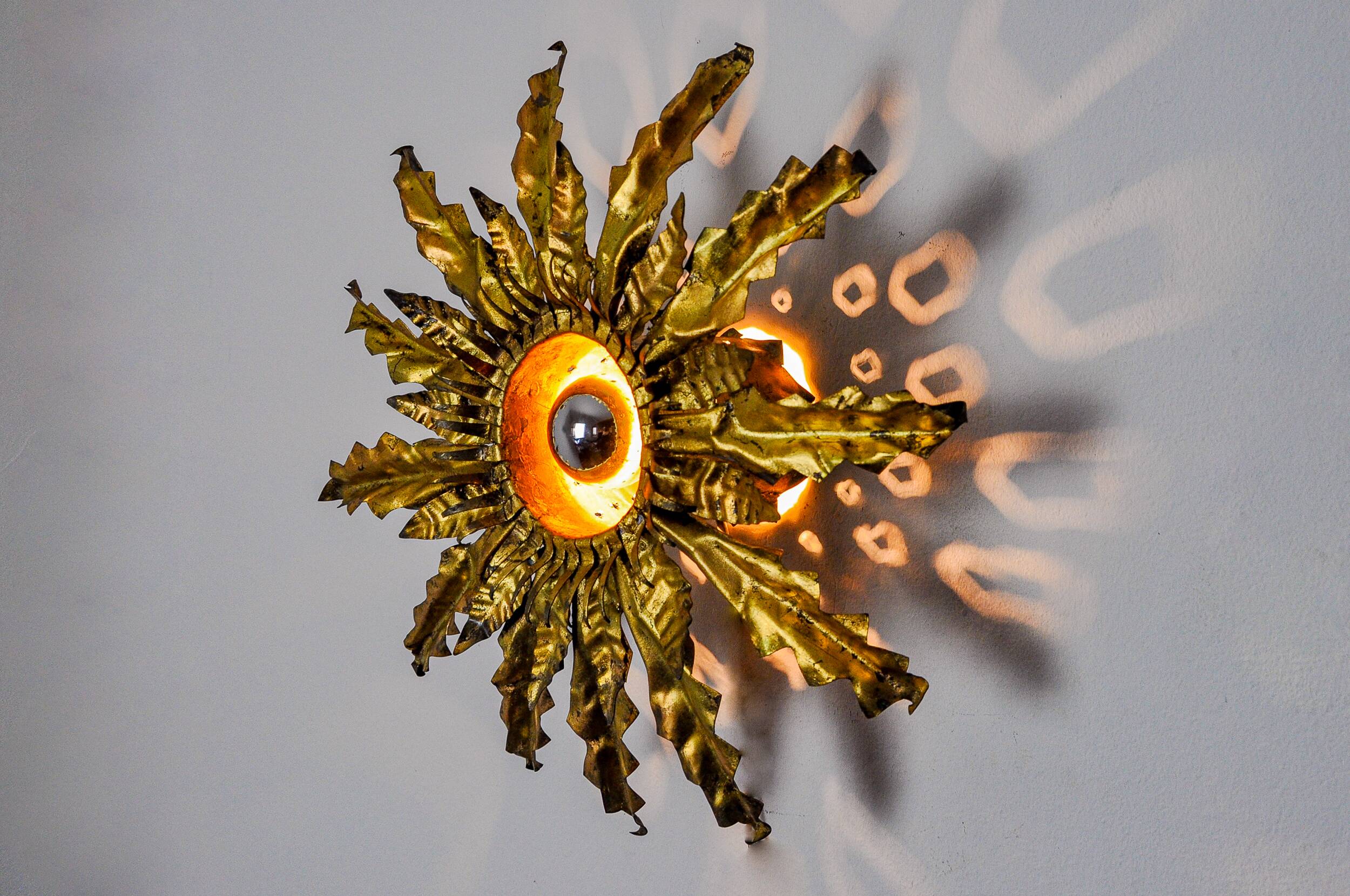 Brutalist sun wall lamp, metal and gold leaf, Italy, 1960
