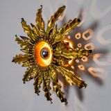 Brutalist sun wall lamp, metal and gold leaf, Italy, 1960