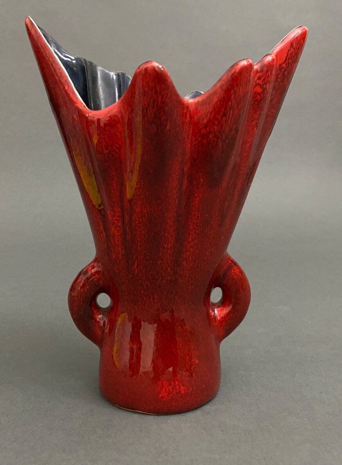 Free form red ceramic vase 1960 by J.L. or J.C.