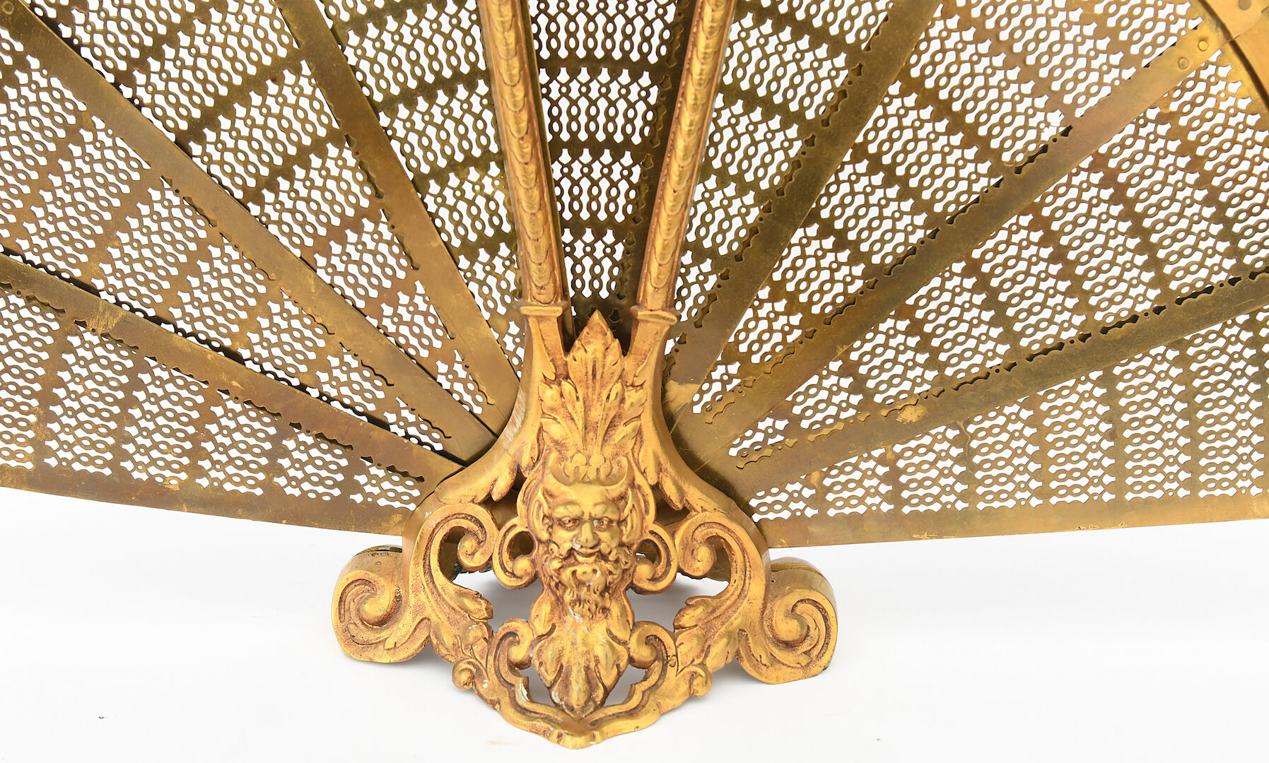 Bronze spark arrestor with fan-shaped openwork brass plates