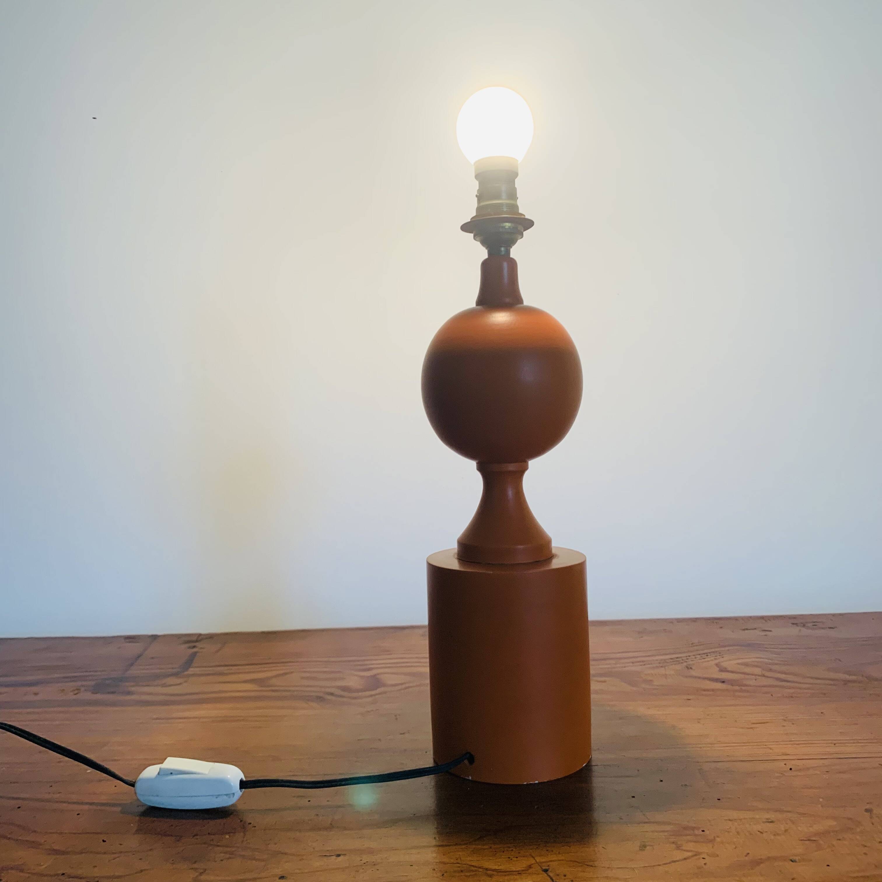Orange turned wooden lamp base