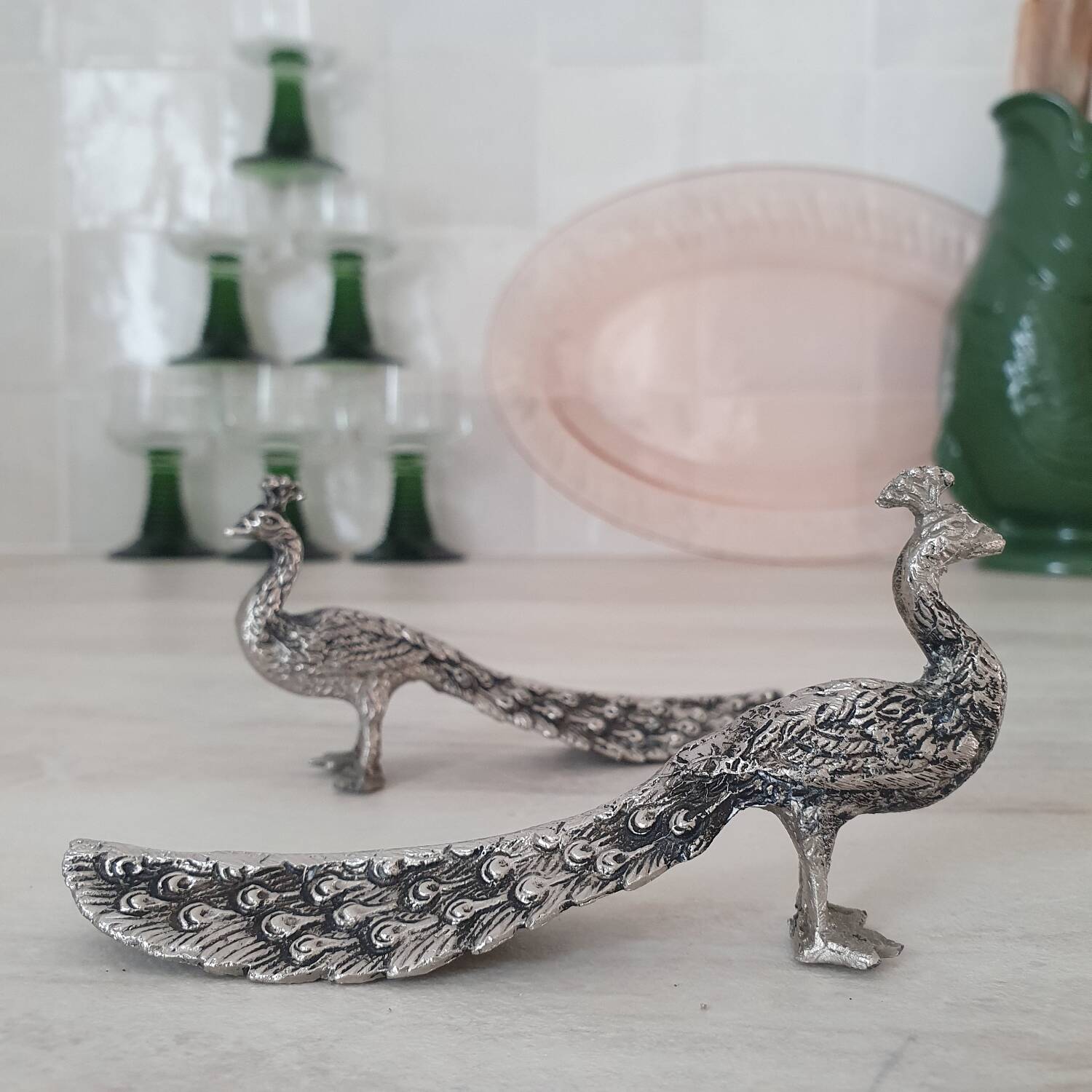 Silver metal peacock
