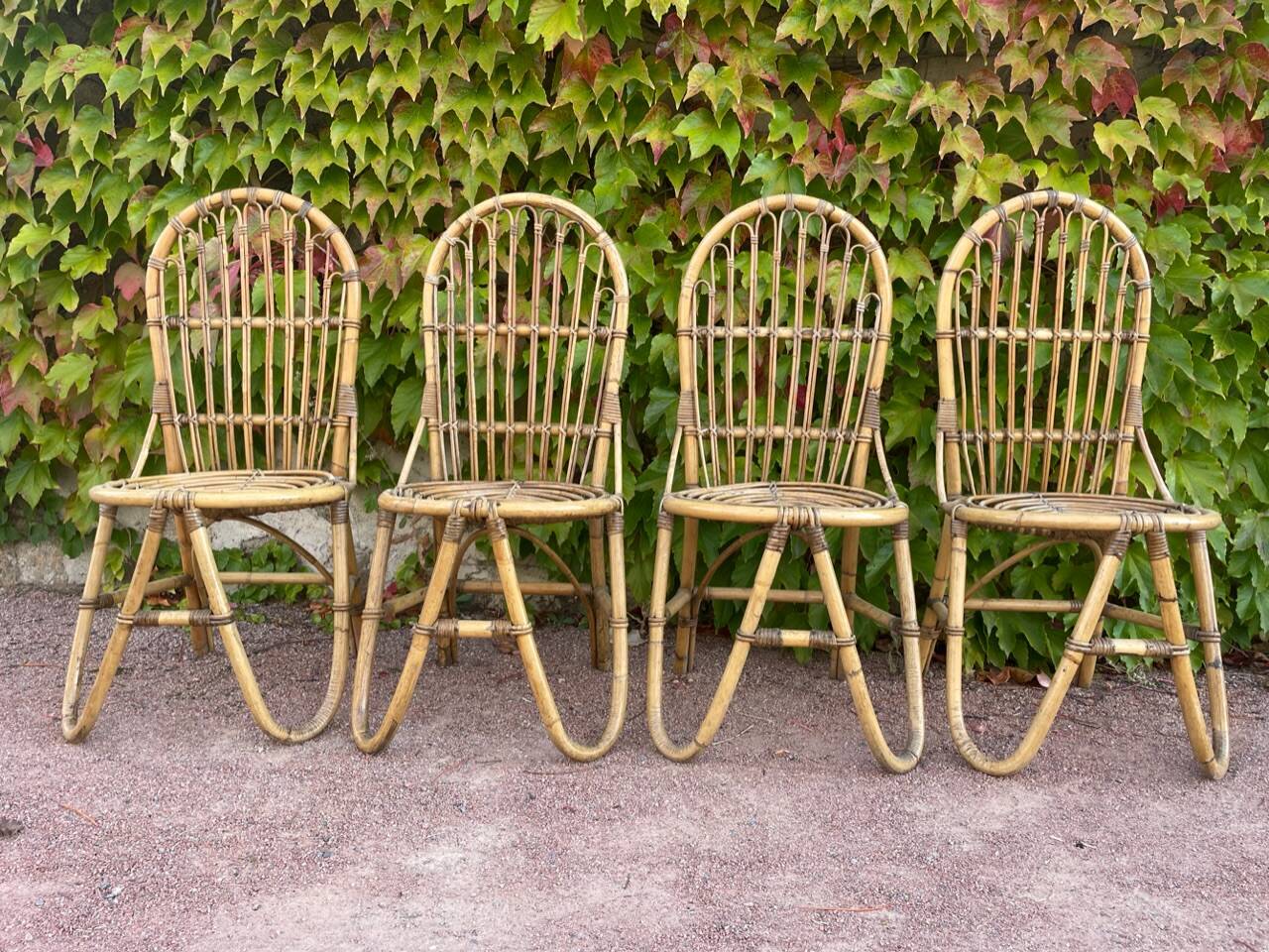 Series of 4 rattan chairs from the 60s