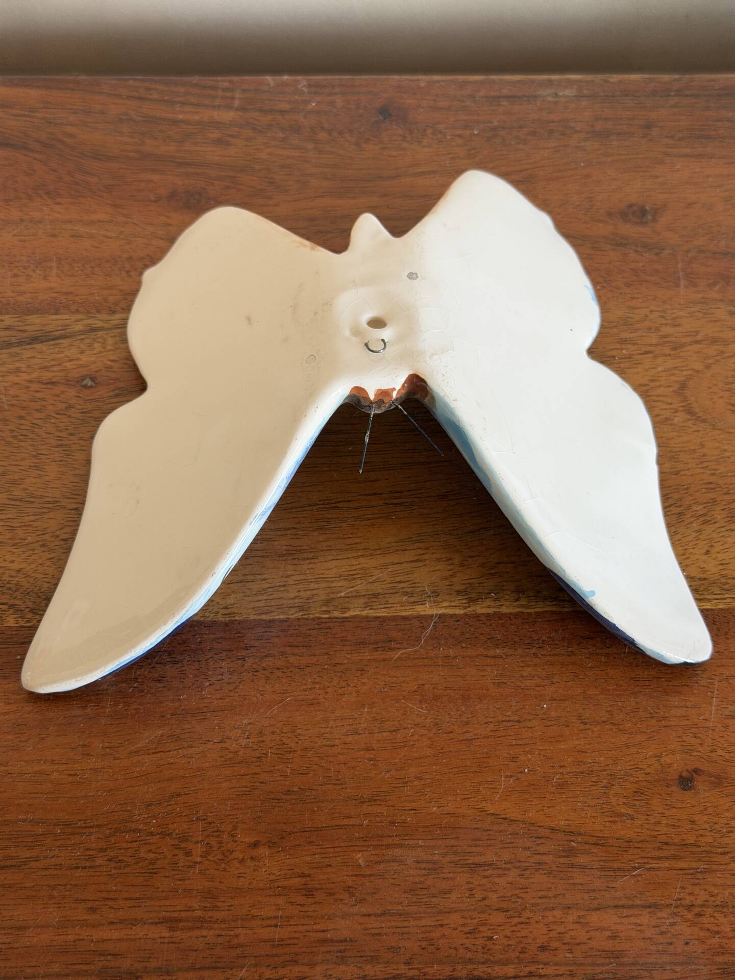 Papillon bleu à accrocher en céramique
