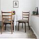 Paire de chaises vintage bois dossier barreaux, assise tissu, style 60s