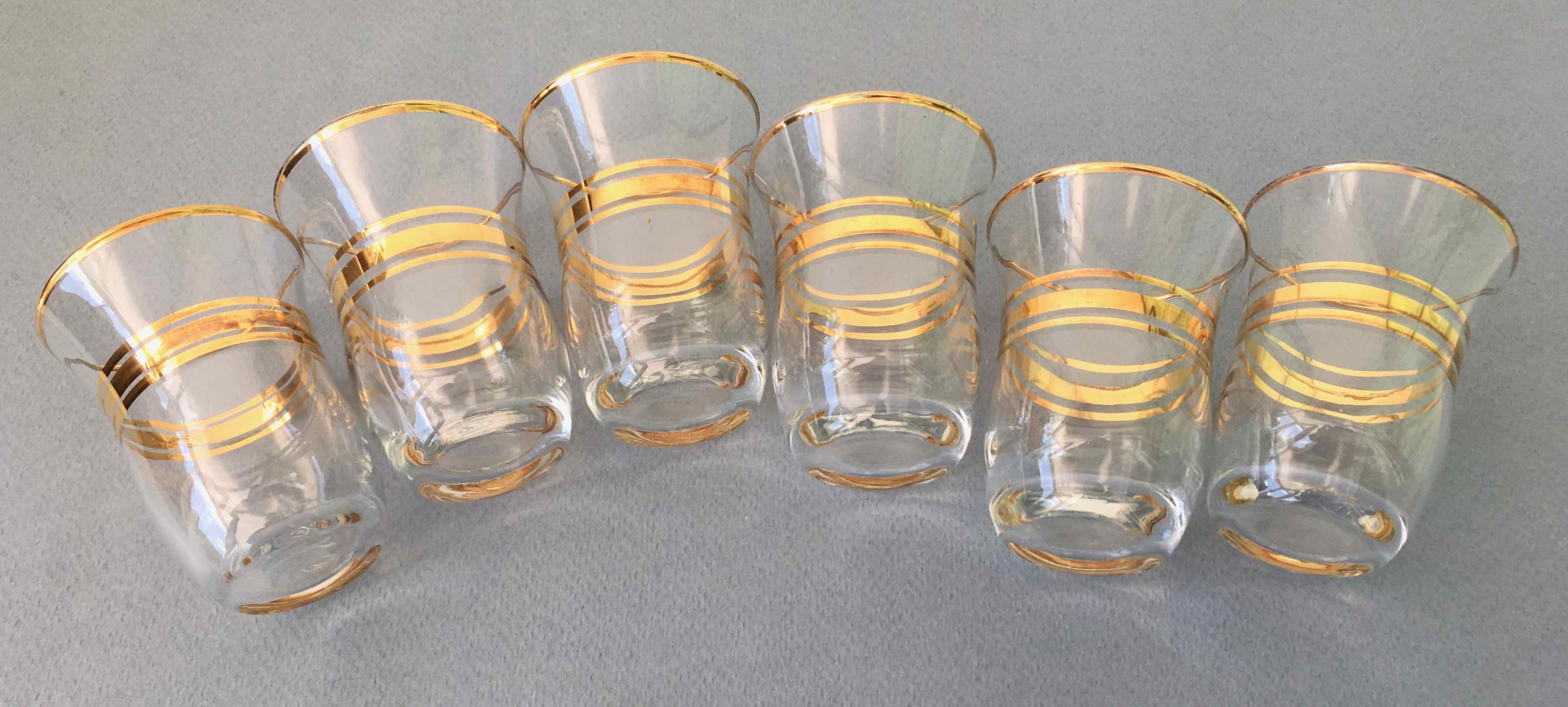 Six glasses of vintage alcohol cups