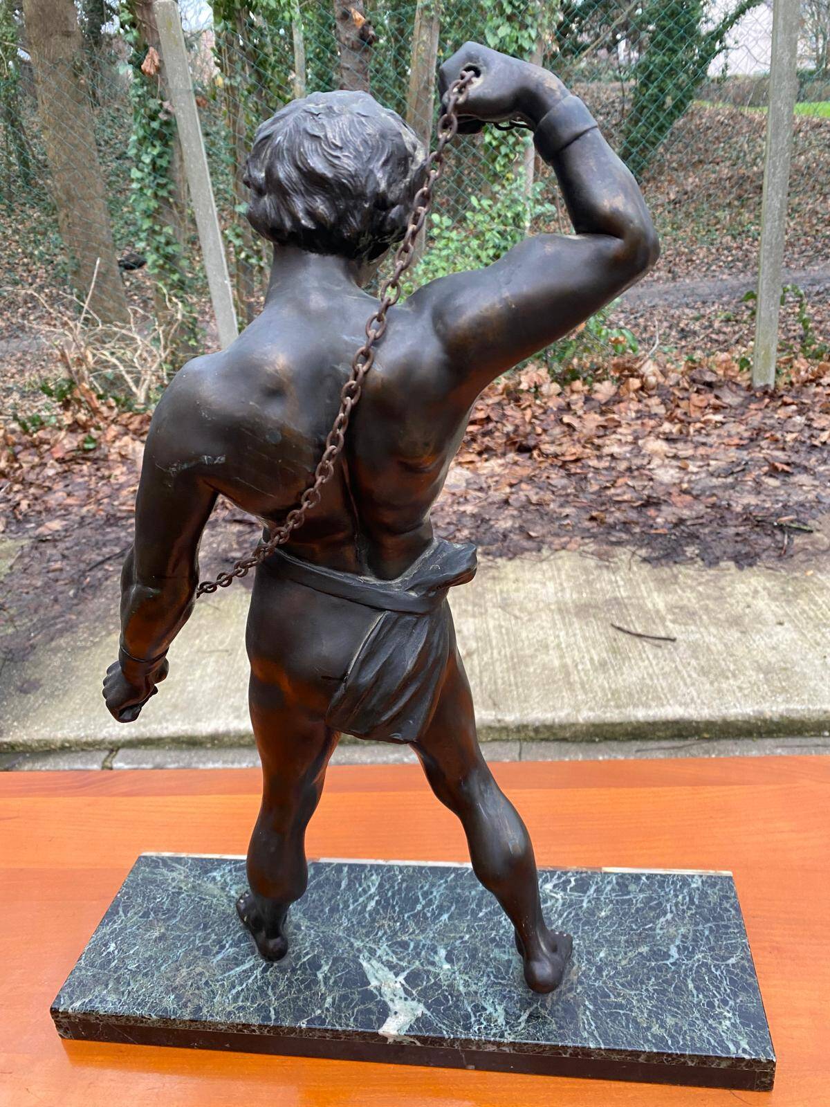 Bronze sculpture "man in chains" on marble 55cm